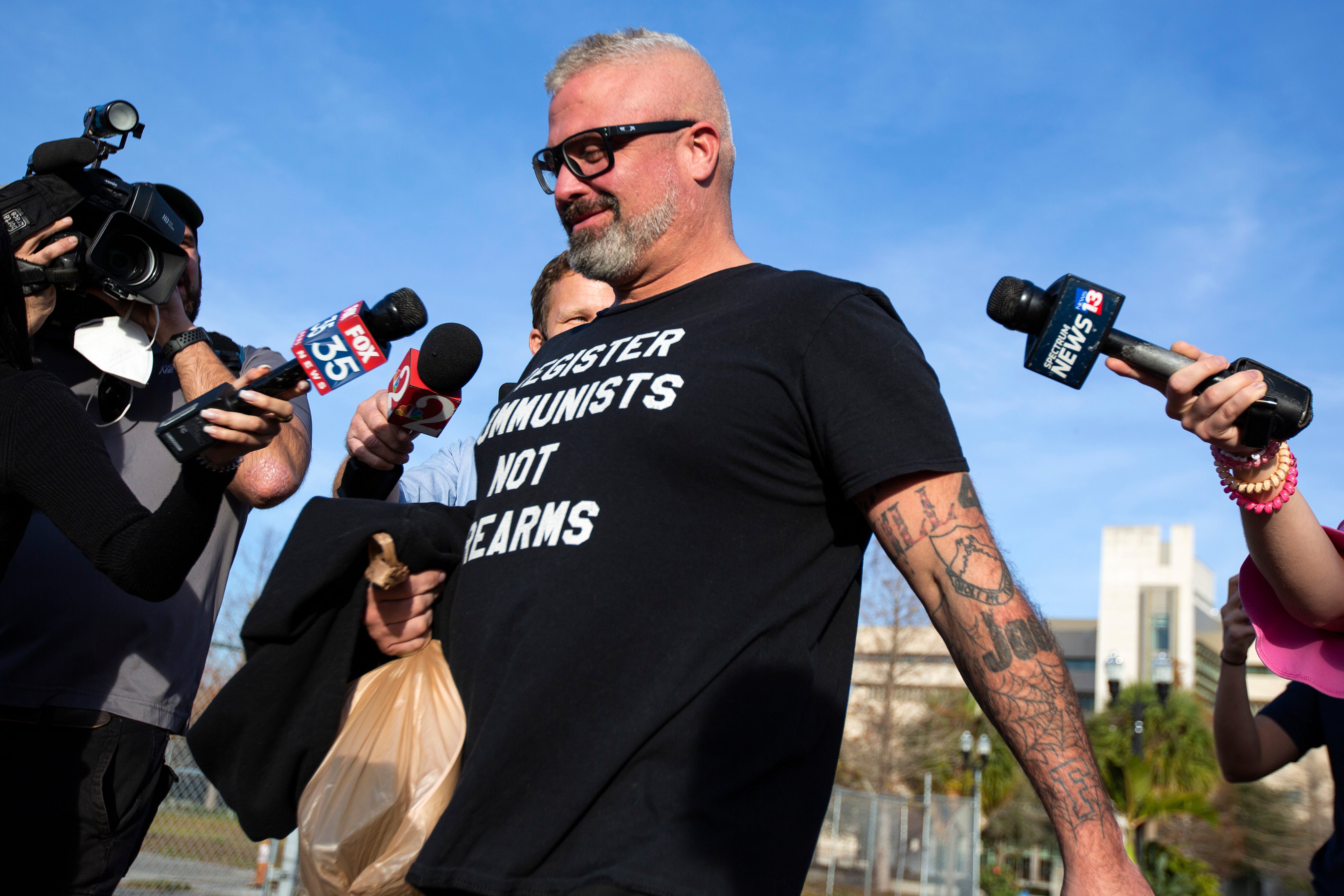 Proud Boys organizer Joseph Biggs walks from the George C. Young Federal Annex Courthouse in Orlando on January 20, 2021