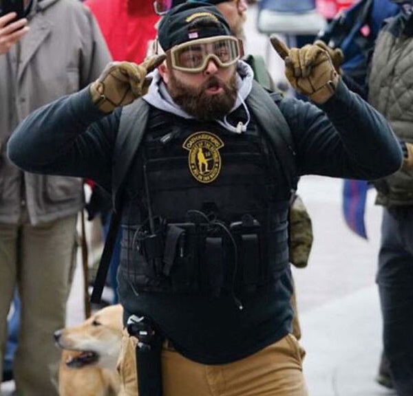 Photograph of Roberto Minuta sporting his Oath Keeper body armor