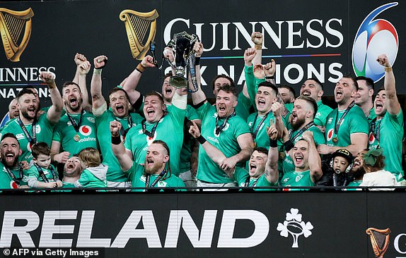 TOPSHOT - Ireland's flanker Peter O'Mahony (R) and Ireland's prop Tadhg Furlong (L) lift the Six Nations trophy after winning the Six Nations international rugby union match between Ireland and Scotland at the Aviva Stadium in Dublin, on March 16, 2024. Ireland retained their Six Nations title with a gritty 17-13 win over Scotland at Lansdowne Road on March 16, 2024. (Photo by PAUL FAITH / AFP) (Photo by PAUL FAITH/AFP via Getty Images)