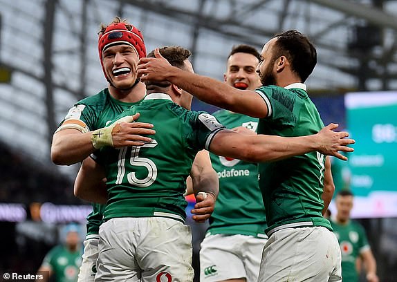 Rugby Union - Six Nations Championship - Ireland v Italy - Aviva Stadium, Dublin, Ireland - February  27, 2022 Ireland's Michael Lowry celebrates scoring their sixth try with teammates REUTERS/Clodagh Kilcoyne