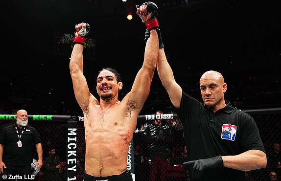 SYDNEY, AUSTRALIA - FEBRUARY 09: Jonathan Micallef of Australia reacts after a victory against Kevin Jousset of France in a welterweight fight during the UFC 312 event at Qudos Bank Arena on February 09, 2025 in Sydney, Australia.  (Photo by Jeff Bottari/Zuffa LLC)