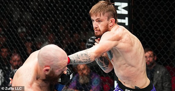 SYDNEY, AUSTRALIA - FEBRUARY 09: (R-L) Tom Nolan of Australia punches Viacheslav Borshchev of Russia in a lightweight fight during the UFC 312 event at Qudos Bank Arena on February 09, 2025 in Sydney, Australia.  (Photo by Jeff Bottari/Zuffa LLC)