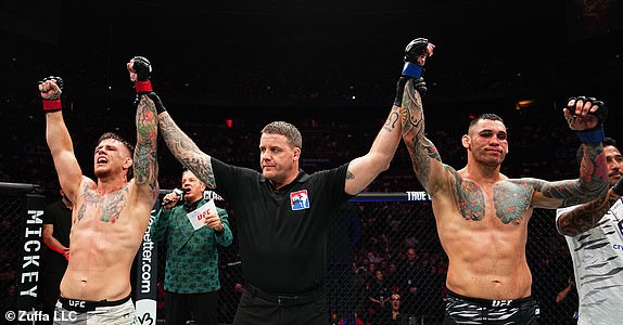SYDNEY, AUSTRALIA - FEBRUARY 09: (L-R) Jimmy Crute of Australia and Rodolfo Bellato of Brazil react after fighting to a draw in a light heavyweight fight during the UFC 312 event at Qudos Bank Arena on February 09, 2025 in Sydney, Australia.  (Photo by Jeff Bottari/Zuffa LLC)