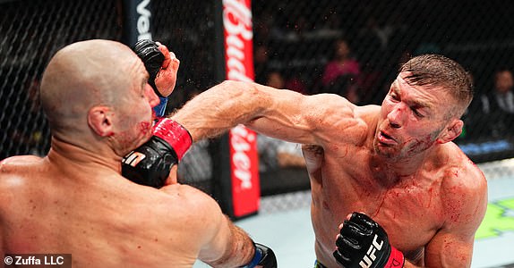 SYDNEY, AUSTRALIA - FEBRUARY 09: (R-L) Dricus Du Plessis of South Africa punches Sean Strickland in the UFC middleweight championship fight during the UFC 312 event at Qudos Bank Arena on February 09, 2025 in Sydney, Australia.  (Photo by Jeff Bottari/Zuffa LLC)