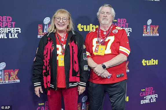 Travis Kelce's parents Donna and Ed Kelce walk the Tubi Purple Carpet before Super Bowl 59 on Sunday, Feb. 9, 2025 in New Orleans. (AJ Mast/AP Content Services for the NFL)