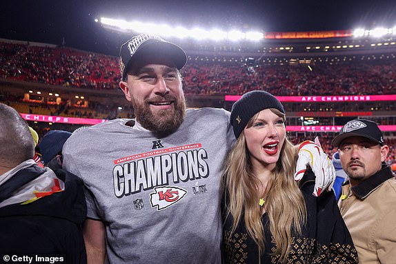KANSAS CITY, MISSOURI - JANUARY 26: Taylor Swift celebrates with Travis Kelce #87 of the Kansas City Chiefs after defeating the Buffalo Bills 32-29 in the AFC Championship Game at GEHA Field at Arrowhead Stadium on January 26, 2025 in Kansas City, Missouri.  (Photo by Jamie Squire/Getty Images) ***BESTPIX***