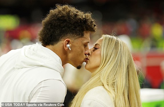 Feb 9, 2025; New Orleans, LA, USA; Kansas City Chiefs quarterback Patrick Mahomes (15) kisses his wife Brittany Mahomes before Super Bowl LIX between the Philadelphia Eagles and the Kansas City Chiefs at Caesars Superdome. Mandatory Credit: Geoff Burke-Imagn Images