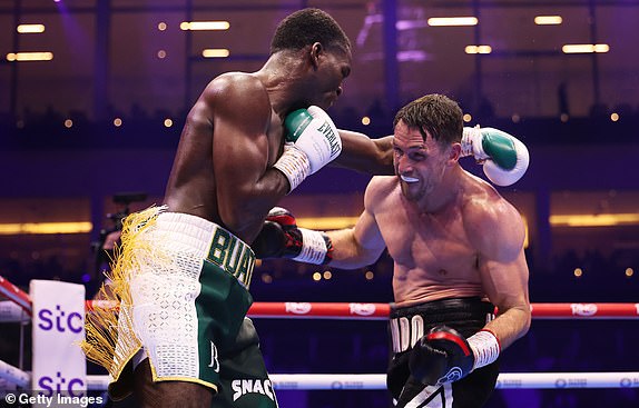 RIYADH, SAUDI ARABIA - FEBRUARY 22: Callum Smith punches Joshua Buatsi during the WBO Interim World Light Heavyweight Title fight between Joshua Buatsi and Callum Smith as part of Beterbiev v Bivol 2: The Last Crescendo at Kingdom Arena on February 22, 2025 in Riyadh, Saudi Arabia. (Photo by Richard Pelham/Getty Images)