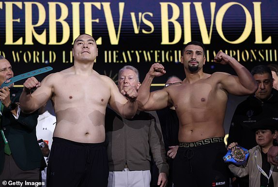 RIYADH, SAUDI ARABIA - FEBRUARY 21: Zhilei Zhang and Agit Kabayel shake hands during the weigh-in ahead of their WBC Interim World Light Heavyweight title fight as part of Beterbiev v Bivol 2: The Last Crescendo at Boulevard Fountain on February 21, 2025 in Riyadh, Saudi Arabia. (Photo by Richard Pelham/Getty Images)