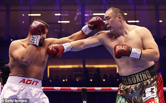 RIYADH, SAUDI ARABIA - FEBRUARY 22: Agit Kabayel and Zhilei Zhang exchange punches during the WBC Interim World Heavyweight Title fight between Zhilei Zhang and Agit Kabayel as part of Beterbiev v Bivol 2: The Last Crescendo at Kingdom Arena on February 22, 2025 in Riyadh, Saudi Arabia. (Photo by Richard Pelham/Getty Images)