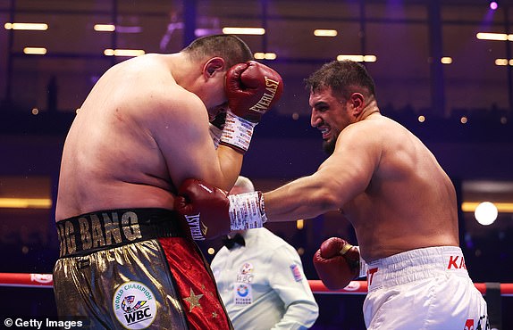 RIYADH, SAUDI ARABIA - FEBRUARY 22: Agit Kabayel punches Zhilei Zhang during the WBC Interim World Heavyweight Title fight between Zhilei Zhang and Agit Kabayel as part of Beterbiev v Bivol 2: The Last Crescendo at Kingdom Arena on February 22, 2025 in Riyadh, Saudi Arabia. (Photo by Richard Pelham/Getty Images)