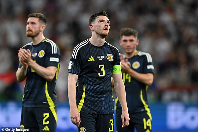 Scotland were torn apart by a blistering Germany side, 3-0 down at half-time with 10 men