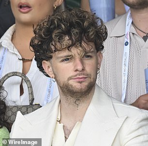 Tom prikazan s tetovažom u lipnju 2022