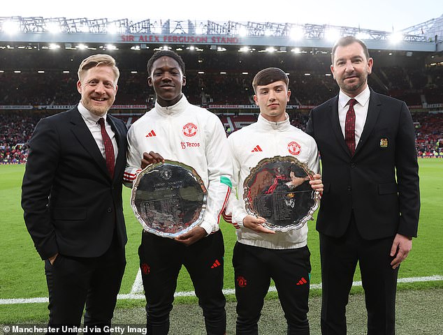 Dan Gore (second right) was United's reserve team player of the year in 2022-23