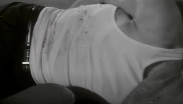 Pri kraju, otkriva se da se vezani, prigušeni muškarac bori i vrišti u stražnjem dijelu automobila - noseći istu odjeću koju je Barry nosio u originalnom videu