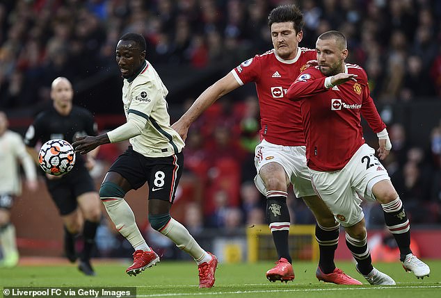 Harry Maguire (middle) apologised for the side's 5-0 defeat by Liverpool in October 2021