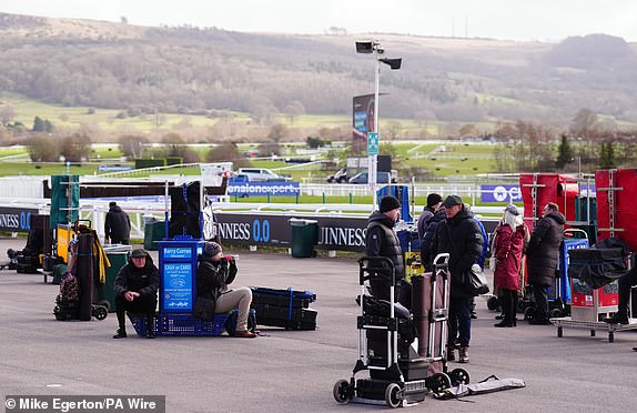 Bookmakers set up their stalls on day one of the 2025 Cheltenham Festival at Cheltenham Racecourse. Picture date: Tuesday March 11, 2025. PA Photo. See PA story RACING Cheltenham. Photo credit should read: Mike Egerton/PA Wire.RESTRICTIONS: Use subject to restrictions. Editorial use only, no commercial use without prior consent from rights holder.