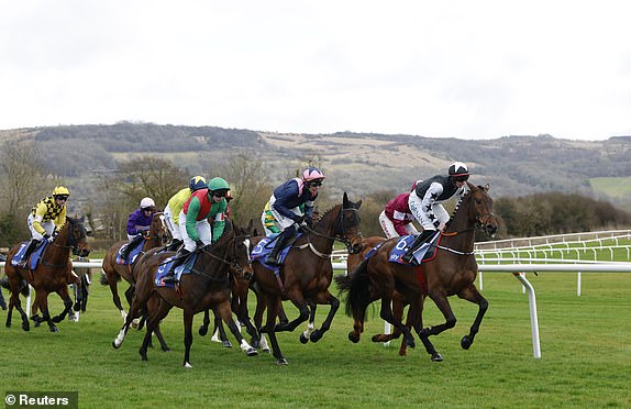 Horse Racing - Cheltenham Festival - Cheltenham Racecourse, Cheltenham, Britain - March 11, 2025 Jack Kennedy riding Romeo Coolio in action with Paul Townend riding Kopek Des Bordes and Sean O'Keeffe riding Karbau during the Supreme Novices' Hurdle race REUTERS/Peter Cziborra