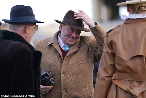 Trainer Nicky Henderson (centre) on day one of the 2025 Cheltenham Festival at Cheltenham Racecourse. Picture date: Tuesday March 11, 2025. PA Photo. See PA story RACING Cheltenham. Photo credit should read: Joe Giddens/PA Wire.RESTRICTIONS: Use subject to restrictions. Editorial use only, no commercial use without prior consent from rights holder.