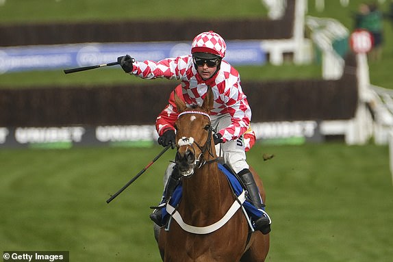 CHELTENHAM, ENGLAND - MARCH 11: Nico de Boinville riding Jango Baie (red/white diamonds) win The My Pension Expert Arkle Challenge Trophy Novices' Chase during Day One of the 2025 Cheltenham Festival at Cheltenham Racecourse on March 11, 2025 in Cheltenham, England. (Photo by Alan Crowhurst/Getty Images)