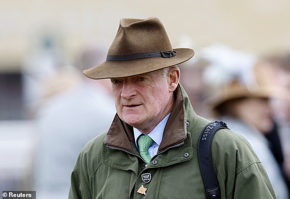 Horse Racing - Cheltenham Festival - Cheltenham Racecourse, Cheltenham, Britain - March 13, 2025 Trainer Willie Mullins before the races REUTERS/Peter Cziborra