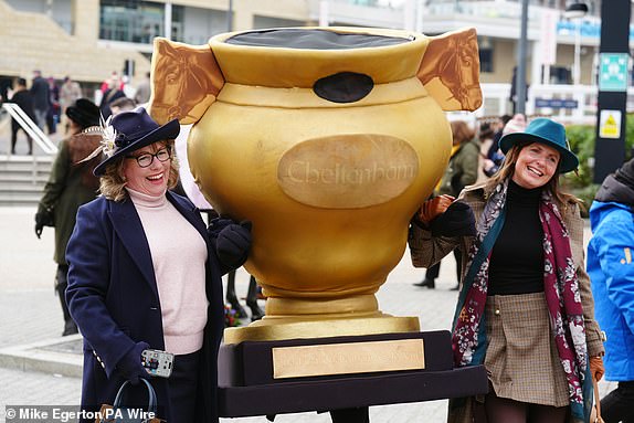 Racegoers on day four of the 2025 Cheltenham Festival at Cheltenham Racecourse. Picture date: Friday March 14, 2025. PA Photo. See PA story RACING Cheltenham. Photo credit should read:Mike Egerton/PA Wire.RESTRICTIONS: Use subject to restrictions. Editorial use only, no commercial use without prior consent from rights holder.