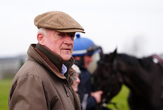 Willie Mullins with Galopin Des Champs the gallops ahead of day four of the 2025 Cheltenham Festival at Cheltenham Racecourse. Picture date: Friday March 14, 2025. PA Photo. See PA story RACING Cheltenham. Photo credit should read: Davies Davies for The Jockey Club/PA Wire.RESTRICTIONS: Editorial Use only, commercial use is subject to prior permission from The Jockey Club/Cheltenham Racecourse.