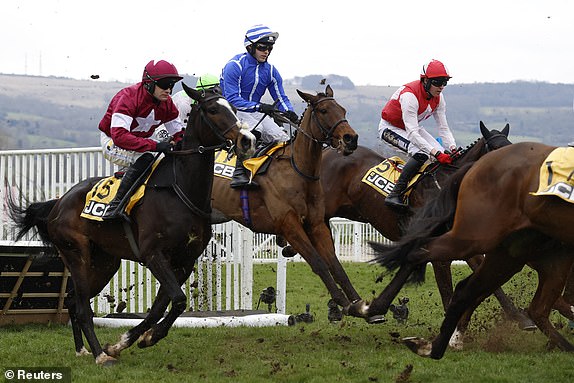 Horse Racing - Cheltenham Festival - Cheltenham Racecourse, Cheltenham, Britain - March 14, 2025 Poniros ridden by Jonjo O'Neill Jr on their way to winning the 13:20 JCB Triumph Hurdle REUTERS/Peter Cziborra