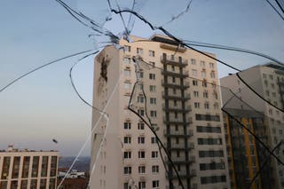 A view shows a damaged apartment building in a residential complex following a drone attack in the village of Sapronovo in the Moscow region on 11 March 2025