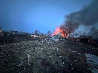 This photo released by Moscow Region Governor Andrei Vorobyev official telegram channel shows the site where one of the shot down Ukrainian drones fell, outside Moscow, Russia