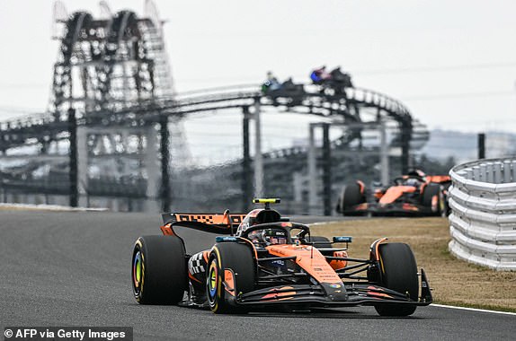 McLaren's British driver Lando Norris (front) leads teammate McLaren's Australian driver Oscar Piastri (behind) during the Formula One Japanese Grand Prix at the Suzuka circuit in Suzuka, Mie prefecture, Japan on April 6, 2025. (Photo by Toshifumi KITAMURA / AFP) (Photo by TOSHIFUMI KITAMURA/AFP via Getty Images)