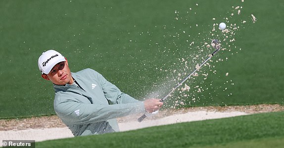 Golf - The Masters - Augusta National Golf Club, Augusta, Georgia, U.S. - April 9, 2025 Collin Morikawa of the U.S. plays out from the bunker on the 2nd hole during a practice round REUTERS/Mike Segar