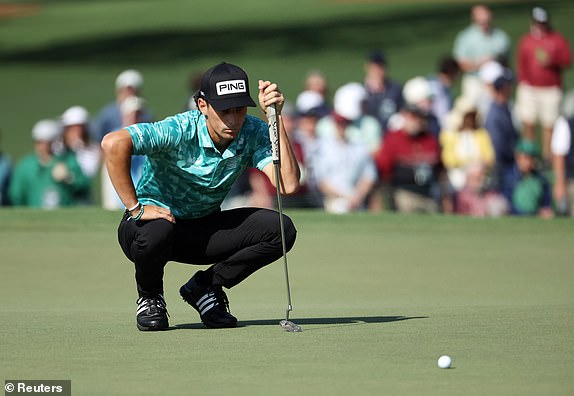 Golf - The Masters - Augusta National Golf Club, Augusta, Georgia, U.S. - April 10, 2025  Chile's Joaquin Niemann lines up his putt on the green on the 2nd hole during the first round REUTERS/Pilar Olivares