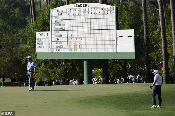 epa12022912 Fred Couples of the US (R) putts off the third green as Harris English of the US (L) looks on during the first round of the 2025 Masters Tournament at the Augusta National Golf Club in Augusta, Georgia, USA, 10 April 2025.  EPA/ERIK S. LESSER