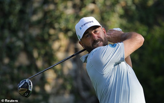 Golf - The Masters - Augusta National Golf Club, Augusta, Georgia, U.S. - April 10, 2025  Germany's Stephan Jaeger hits his tee shot on the 2nd hole during the first round REUTERS/Mike Blake