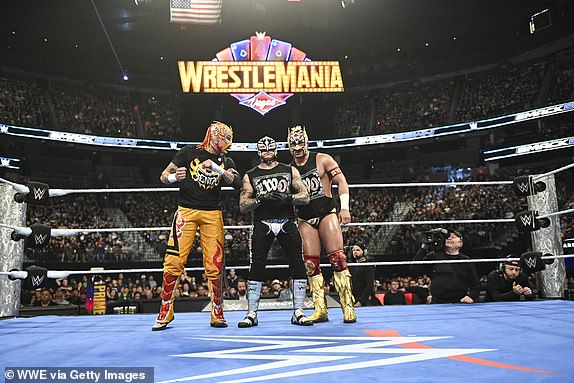 LAS VEGAS, NEVADA - APRIL 18: Rey Fenix, Rey Mysterio, Dragon Lee During Friday night Smackdown at T-Mobile Arena on April 18, 2025 in Las Vegas, Nevada.  (Photo by Andrew Timms /WWE via Getty Images)