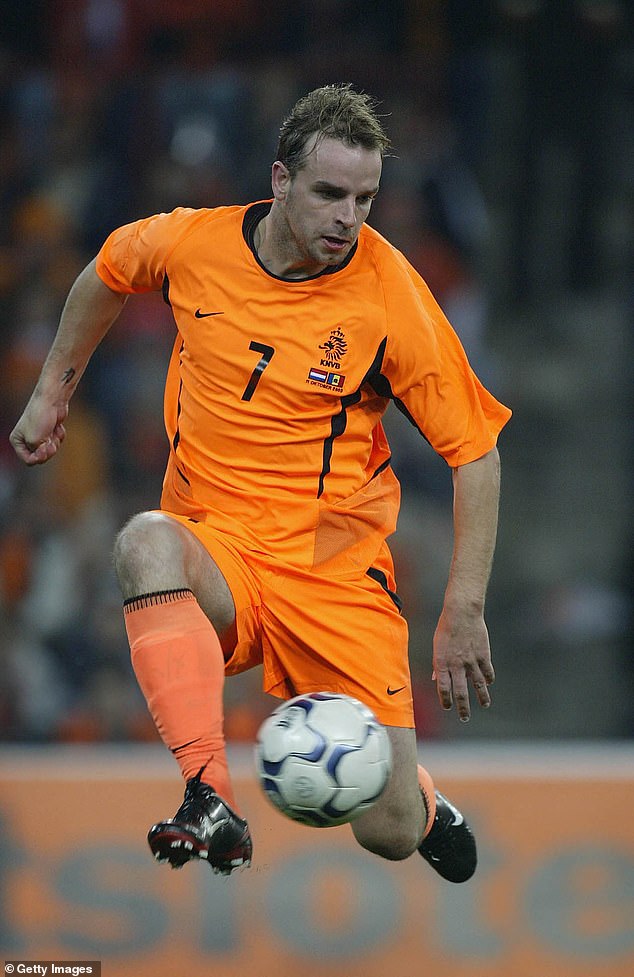Van der Meyde takes the ball for the Netherlands in a Euro 2004 qualifying match against Moldova. He made 17 appearances for his country between 2002 and 2004, scoring one goal