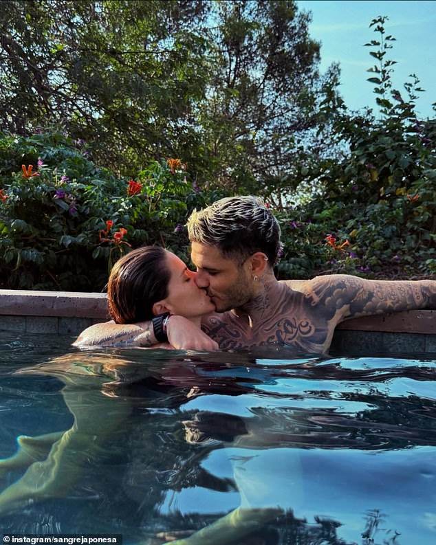 The competing WAGs both have similar loved up photographs with the Argentine forward on their Instagram pages