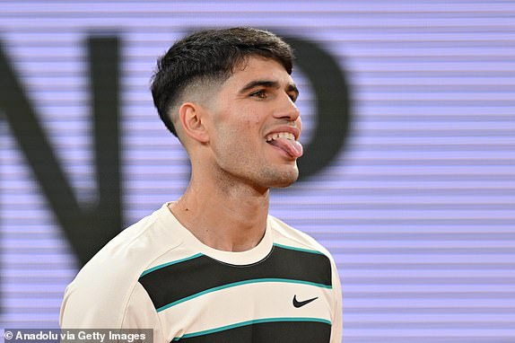 PARIS, FRANCE - MAY 28: Carlos Alcaraz of Spain in action against Fabian Marozsan (not seen) of Hungary during their Men's Singles tennis match on Day Four of the 2025 Roland-Garros at Philippe-Chatrier Court in Paris, France on May 28, 2025. (Photo by Mustafa Yalcin/Anadolu via Getty Images)
