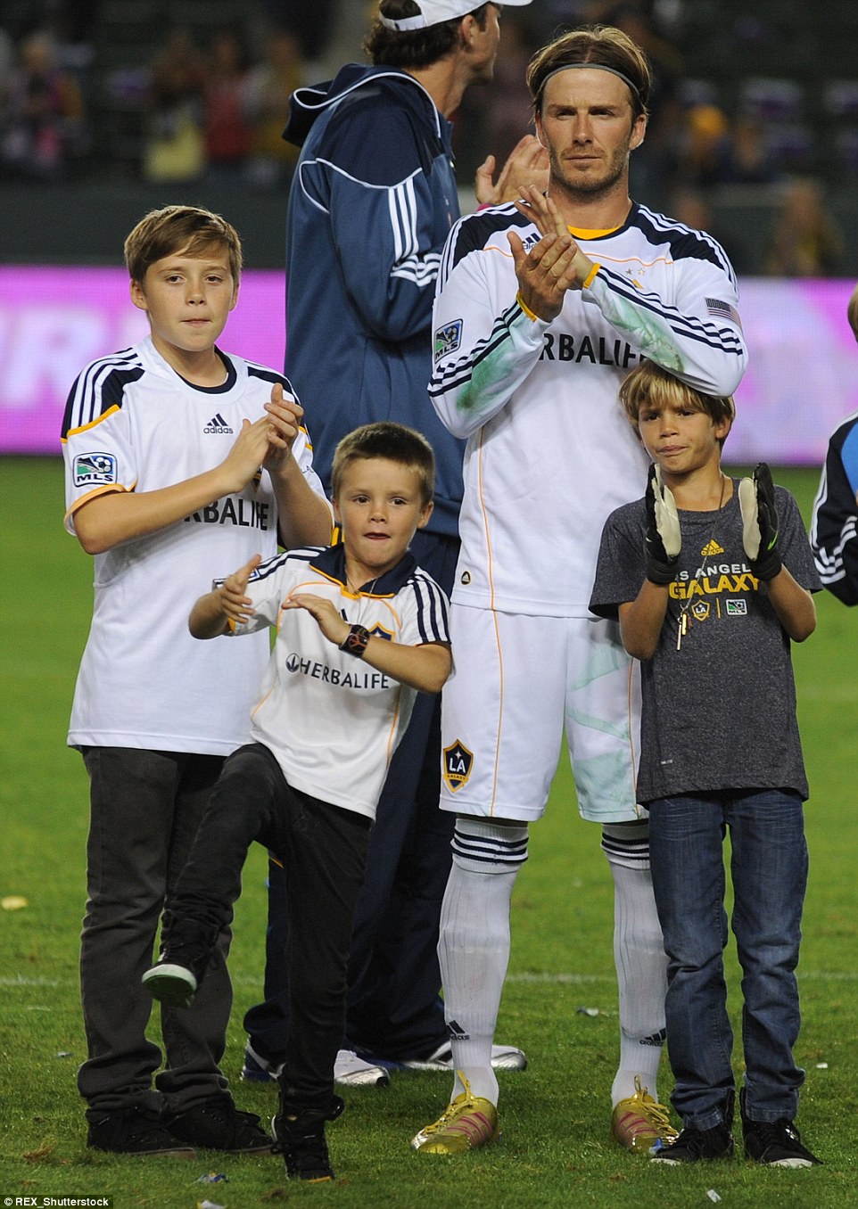 Beckham shares his love for football with his three boys Brooklyn, Cruz and Romeo