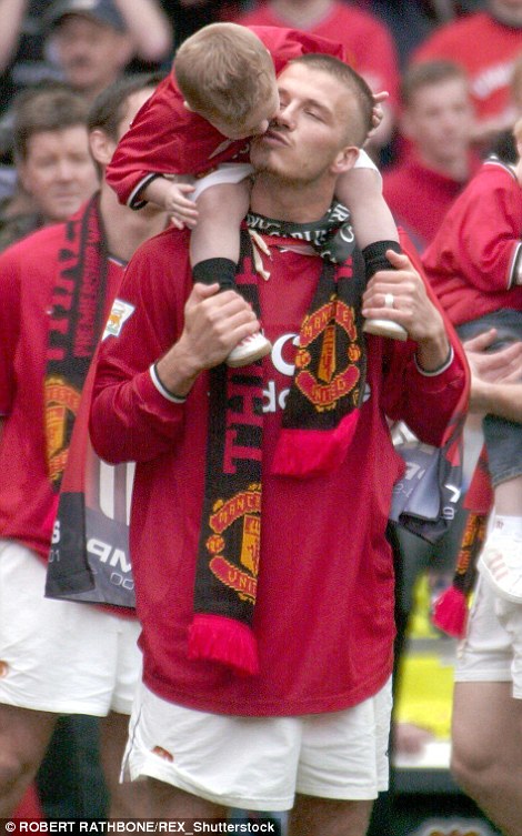 Brooklyn helped David celebrate winning the league title in 2001...