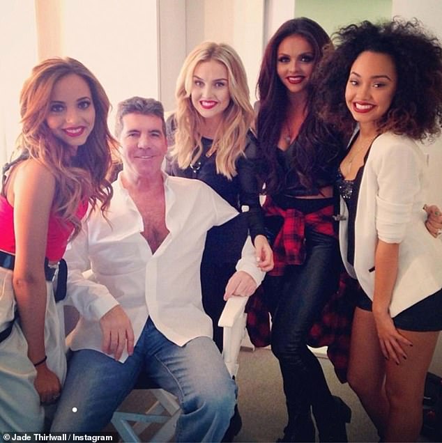 Jade, upucana u slavu 2011. godine kada se pojavila na X-Factor-u i bila je smještena u grupu za djevojke Little Mix zajedno s Jesy Nelson, Perrie Edwards i Leigh-Anne Pinnock (slika L do R sa Simonom u 2018. godini)