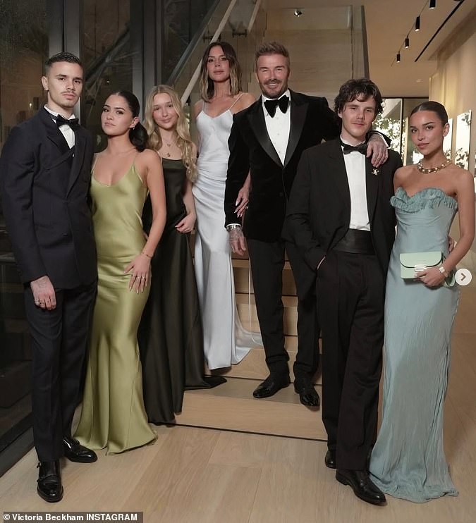 David's birthday celebrations began in Miami and he is pictured here (L to R) with his son Romeo, his girlfriend Kim Turnbull, daughter Harper, wife Victoria, and son Cruz and his girlfriend Jackie Apostel