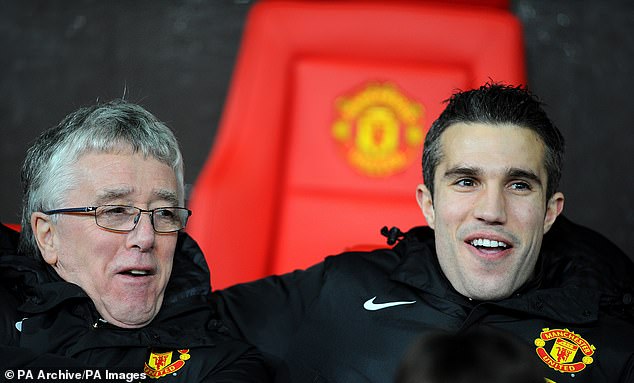Morgan, pictured here with striker Robin van Persie, spent 20 years as United's kit man