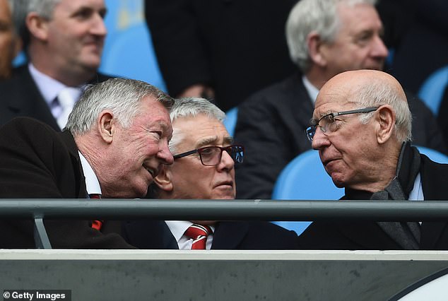 Albert Morgan (centre) with United legends Sir Alex Ferguson and Sir Bobby Charlton in 2016