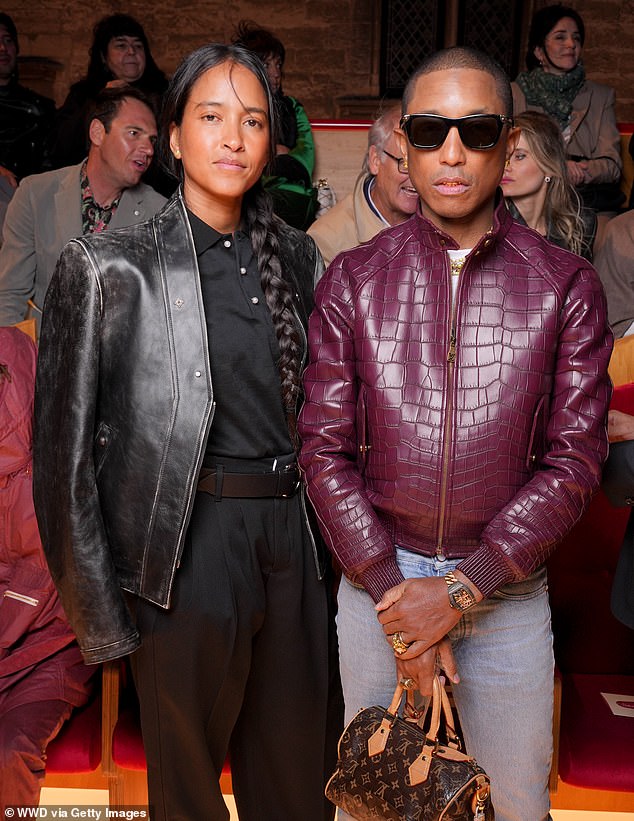 Pharrell Williams stavio je trendi zaslon u ljubičastu kožnu jaknu dok je izašao s Helen Lasichanh