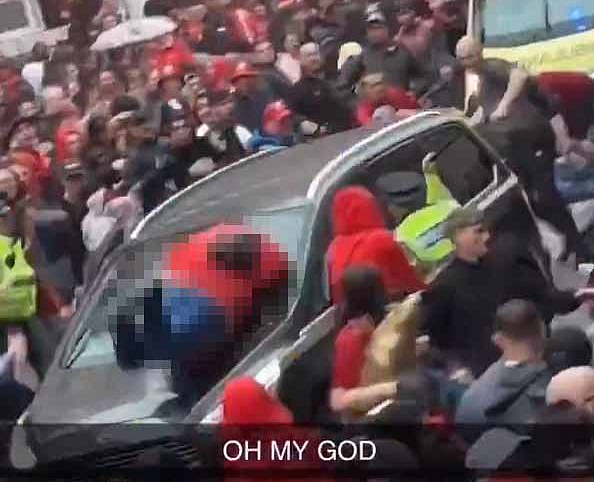 Distressing footage captured the moment that the people carrier struck fans gathering for the parade