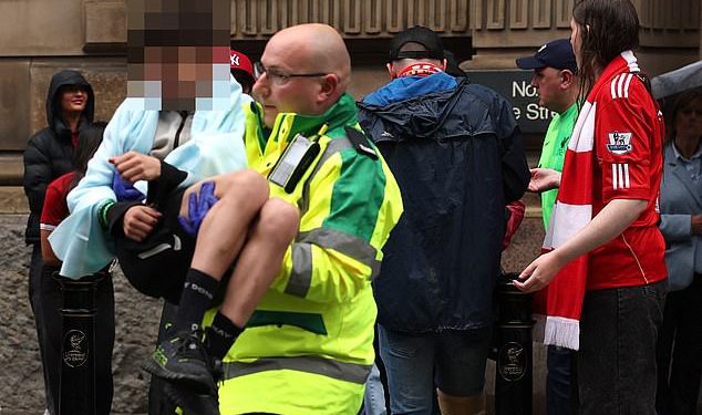 Four children among 47 hurt in Liverpool parade horror: ‘White Brit’ driver, 53, tore through crowd at 30mph leaving 250-yard trail of devastation before being dragged from vehicle by mob screaming ‘kill him’ – police say it’s NOT terrorism
