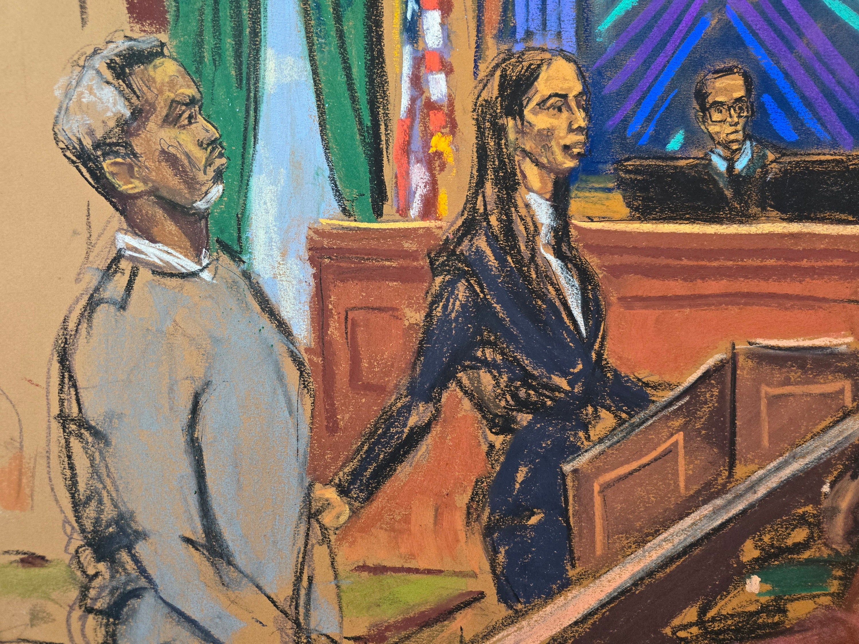 Diddy, sportski sivi pulover, ustao je dok su ga njegovi odvjetnici upoznali s porotom tijekom uvodne izjave.