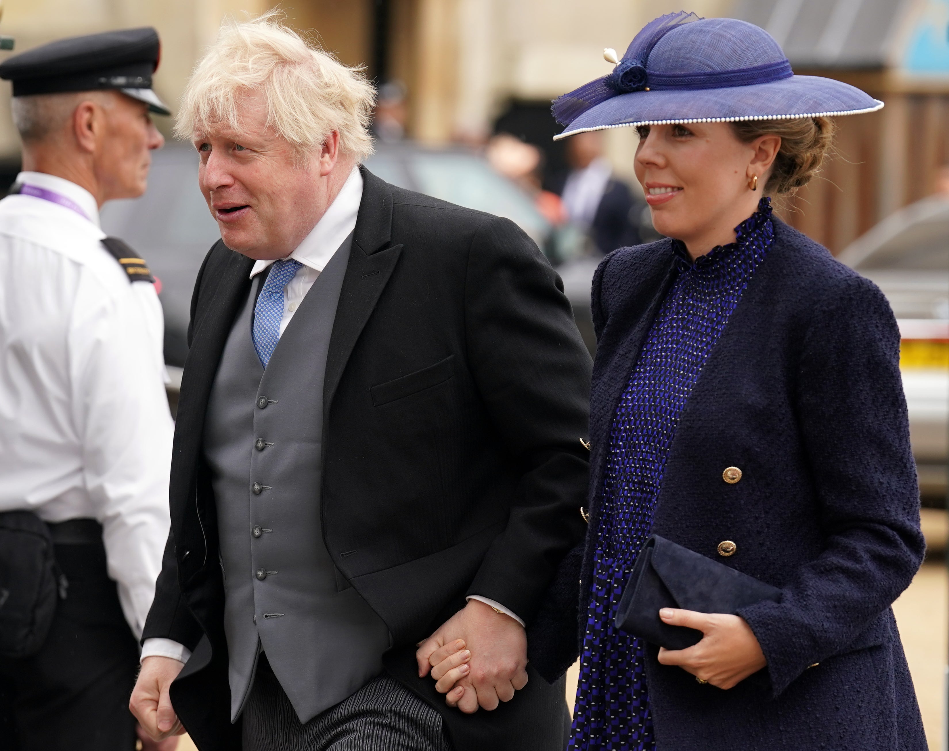Bivši premijer Boris Johnson i njegova supruga Carrie Johnson koji su stigli u opatiju Westminster (Andrew Milligan/PA)
